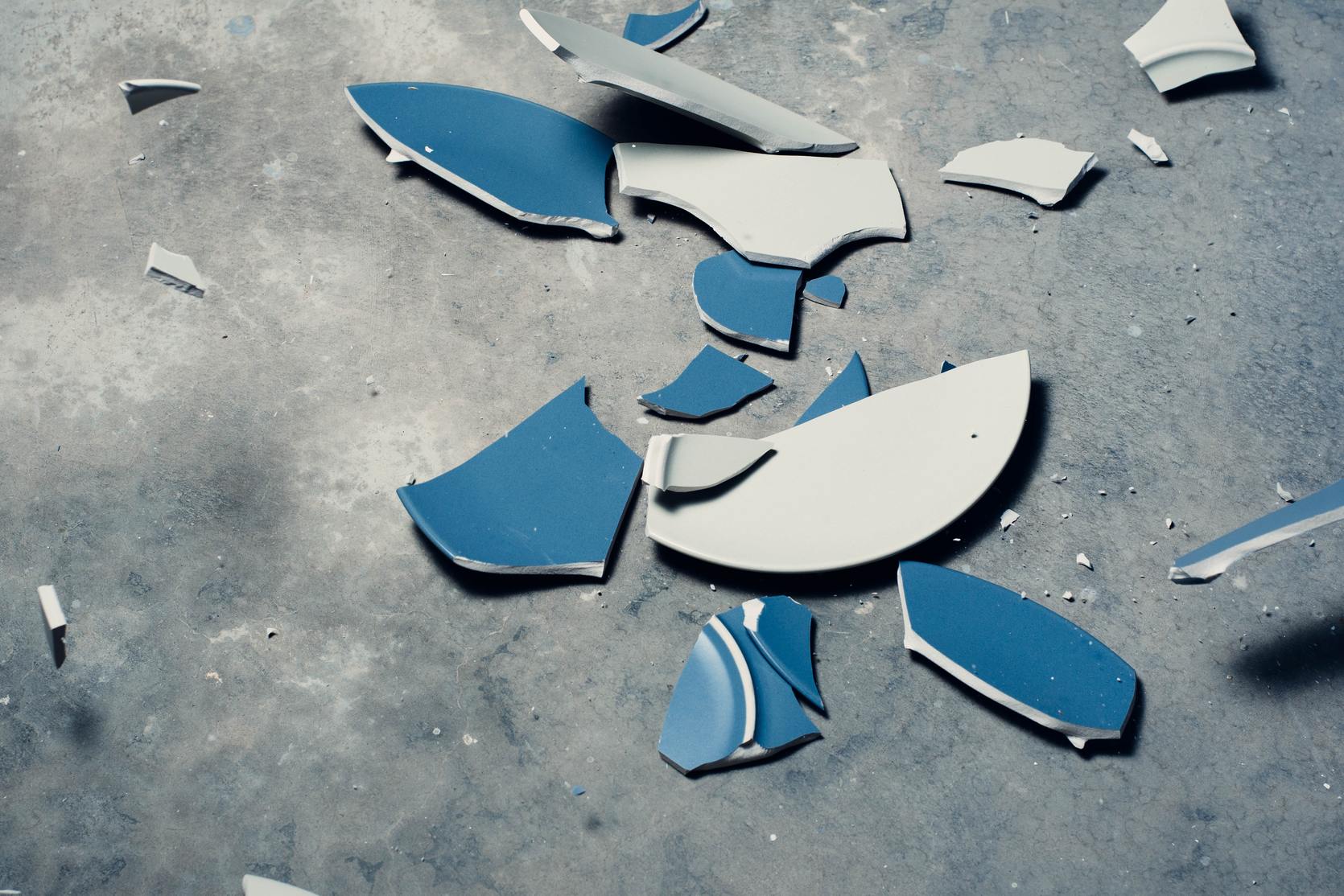 broke blue plate